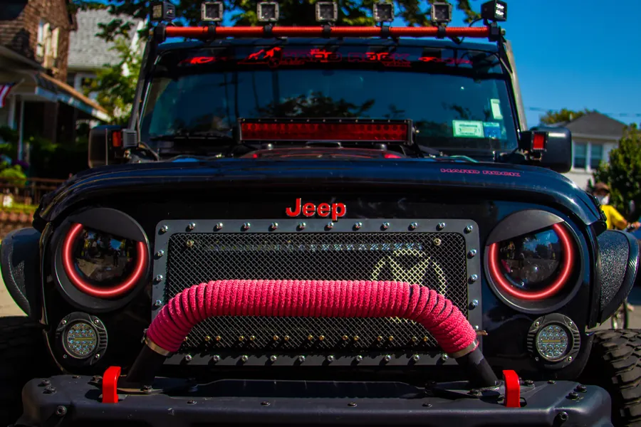 Jeep Wrangler front grille with red halo headlights